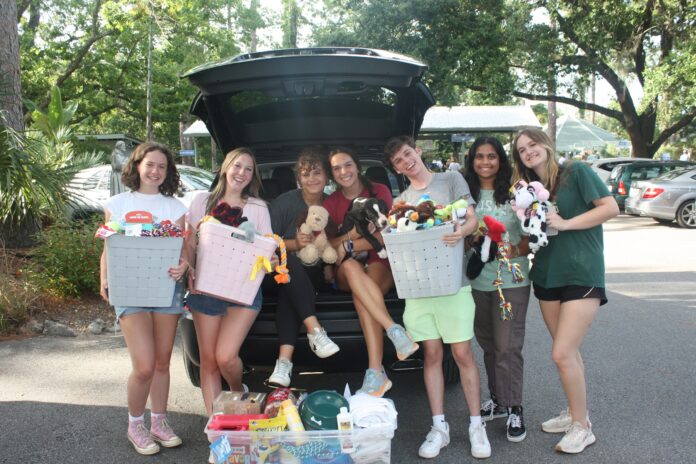 Together Tallahassee volunteers collecting items for Big Dog Rescue