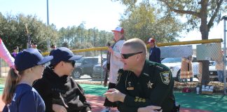 St. Johns County Sheriff Robert Hardwick speaks with athletes at the Field of Dreams. Photo courtesy St. Johns County Public Affairs