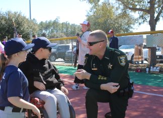 St. Johns County Sheriff Robert Hardwick speaks with athletes at the Field of Dreams. Photo courtesy St. Johns County Public Affairs