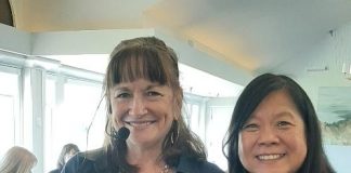 Linda Fazio, store manager for Chico’s clothing store location in Sawgrass Village, left, and NNSJ Co-Vice President Suzy Catania, right, are pictured at the Newcomers January luncheon meeting’s member model fashion show. Photo courtesy Newcomers of North St. Johns