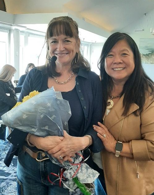 TCL NNSJ luncheon 2603 Linda Fazio, store manager for Chico’s clothing store location in Sawgrass Village, left, and NNSJ Co-Vice President Suzy Catania, right, are pictured at the Newcomers January luncheon meeting’s member model fashion show. Photo courtesy Newcomers of North St. Johns