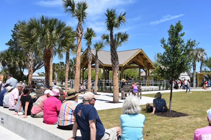 Park visitors watch the Honey Badgers perform. Photo by Kate Kimmel/Nassau NewsLine