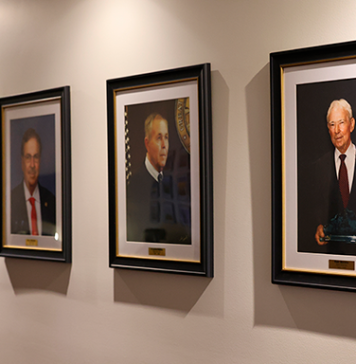 Portraits of four former State Attorneys who served Florida’s Seventh Judicial Circuit now hang at the S. James Foxman Justice Center in Daytona Beach. Photo by Haley Harrison, Office of State Attorney R.J. Larizza