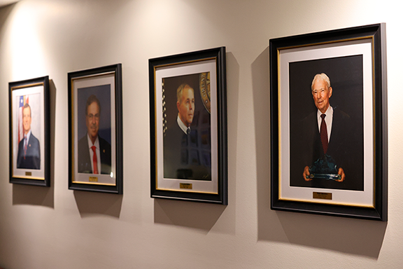 32-web2 Portraits of four former State Attorneys who served Florida’s Seventh Judicial Circuit now hang at the S. James Foxman Justice Center in Daytona Beach. Photo by Haley Harrison, Office of State Attorney R.J. Larizza