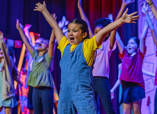 A young performer sings during Hickory Creek Elementary's production of "Dare to Dream" held April 8-10. Photo courtesy Hickory Creek Elementary