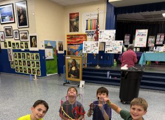 Students work on a collaborative art piece during Ocean Palms Elementary's Family Night. Photo courtesy Ocean Palms Elementary PTO