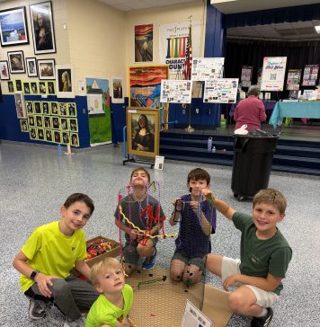 Students work on a collaborative art piece during Ocean Palms Elementary's Family Night. Photo courtesy Ocean Palms Elementary PTO