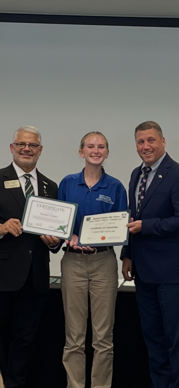 Kendyl Corper, a senior at Bartram Trail High School, holds a certificate of completion after earning her private pilot license this summer. Photo courtesy Bartram Trail AFJROTC
