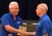Jamie Mackey honored as Rotarian of the Year Jamie Mackey, left, receives the Rotarian of the Year award from 2005-06 Club President Mitch Ross. Photo courtesy Rotary Club of Bartram Trail - Julington Creek