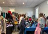 Shoppers browse clothing, jewelry and accessories at a previous Mandarin Garden Club sale. Photo courtesy Mandarin Garden Club