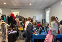 Shoppers browse clothing, jewelry and accessories at a previous Mandarin Garden Club sale. Photo courtesy Mandarin Garden Club