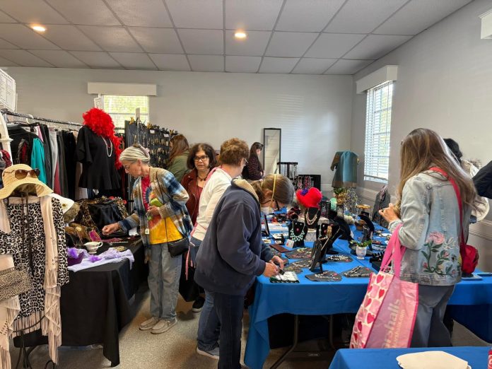 Shoppers browse clothing, jewelry and accessories at a previous Mandarin Garden Club sale. Photo courtesy Mandarin Garden Club