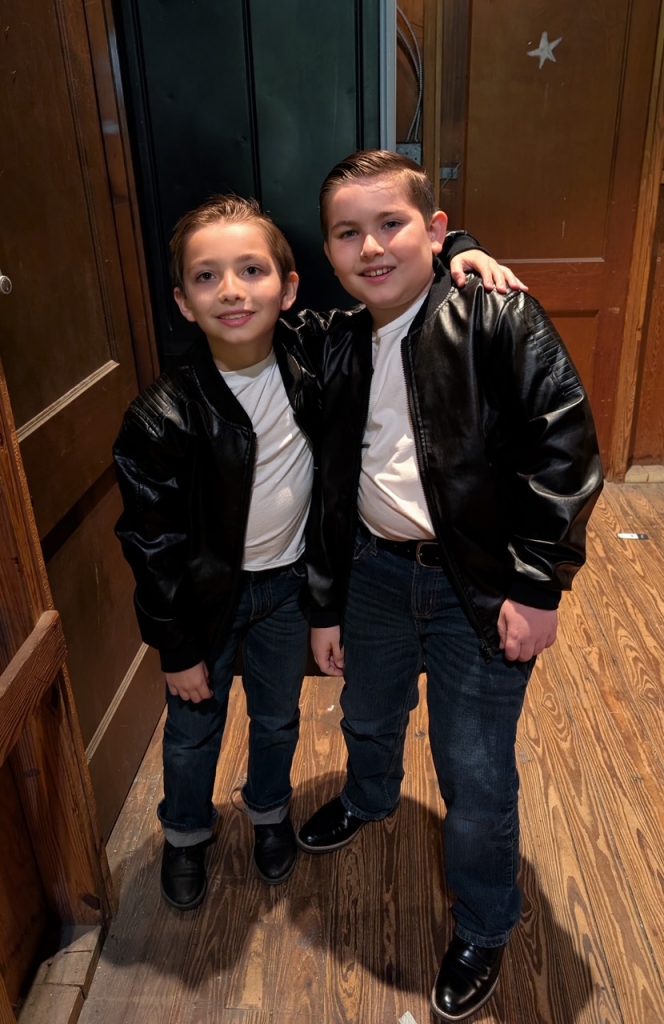 Two young performers pose backstage in costume during a past Theatre Troupe 1776 production at the Mandarin Community Club. Photo courtesy of Theatre Troupe 1776.