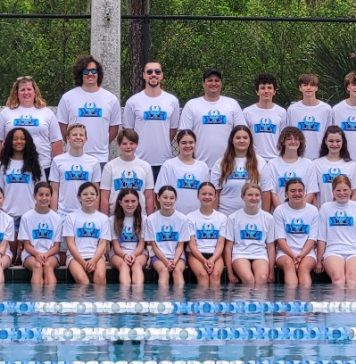 The First Coast Y FLYERS Competitive Team gathers for a group photo. Photo courtesy First Coast YMCA