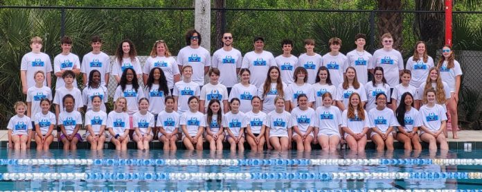 The First Coast Y FLYERS Competitive Team gathers for a group photo. Photo courtesy First Coast YMCA