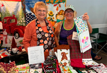 Vendors display handmade quilted towels and linens at a past Mandarin Garden Club Craft Fair. Photo courtesy of Mandarin Garden Club