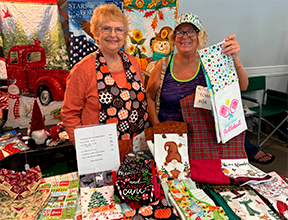 Vendors display handmade quilted towels and linens at a past Mandarin Garden Club Craft Fair. Photo courtesy of Mandarin Garden Club